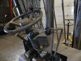 an image of a fork lift truck in a warehouse