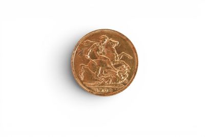 a penny on a white surface with a white background