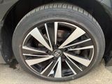 a close up of a tire on a car ' s rim