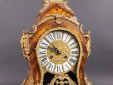 a clock that is sitting on top of a table