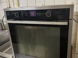 a microwave that is sitting on a counter in a kitchen
