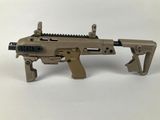 a close up of a toy gun on a white surface