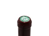 a bottle of wine that is sitting on a table