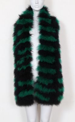 a mannequin mannequin wearing a green and black fur coat