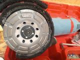 a close up of a machine that is being worked on