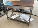 a large metal table with a box on top of it