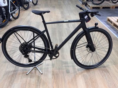 a bike that is sitting on a stand in a store