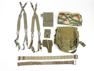 an assortment of military items including a belt, pouch, belt, and other items
