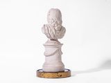 marble bust of a woman on a pedestal on a white background