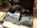 a tool in a tool box on the floor