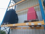 a stack of boxes on a pallet in a warehouse