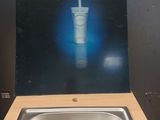a box with a picture of a sink and a faucet
