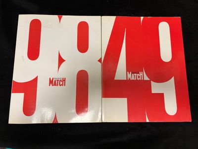 two red and white numbered numbers on a black background
