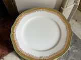 a plate that is sitting on the floor next to a door