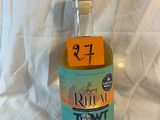 a bottle of rum that is sitting on a white sheet