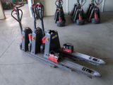 many different types of electric pallets in a garage