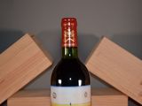 a bottle of wine that is sitting on a table