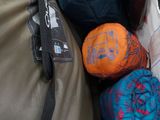 many balls of yarn in a bag on the ground