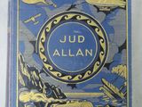 un livre bleu sur lequel figurent l'image d'un bateau et d'autres choses