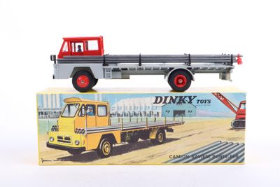 a toy truck that is sitting on top of a box