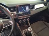 the interior of a car with a steering wheel and dashboard controls