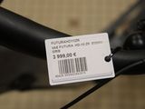 a picture of a bicycle with a price tag attached to it ' s handlebars