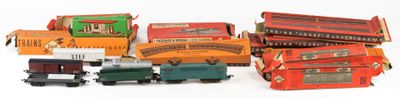 a lot of small toy trains sitting on a white surface