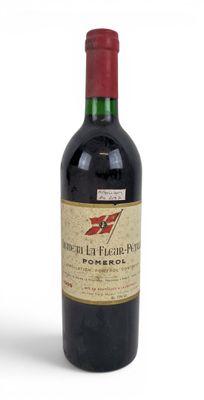 a bottle of wine that is sitting on a table
