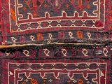 an image of a close up of two rugs on a table