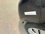 a sticker on the side of a car that has a sticker on it