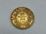 a gold coin with the words, ' great britain ' written on it