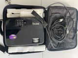 a black bag with a cord and a charger inside of it