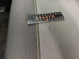 a close up of a piece of fabric with a ruler on it