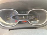 a close up of a car dashboard with a speedometer