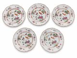 six chinese porcelain plates with floral designs and gold rims