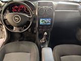 a picture of a car dashboard with a steering wheel and dashboard controls