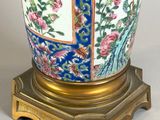 a vase that is sitting on a stand on a table