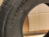 a close up of a tire on a box with a box in the background