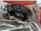 un sac en plastique dans lequel se trouve un siège