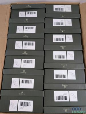 several boxes of black and white barcodes are stacked on top of each other