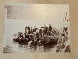a lot of people that are on a boat in the water