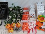 a table with a lot of halloween decorations on it