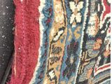 an image of a close up of a rug on the floor