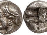une pièce de monnaie en argent portant l'image d'un homme et d'une femme