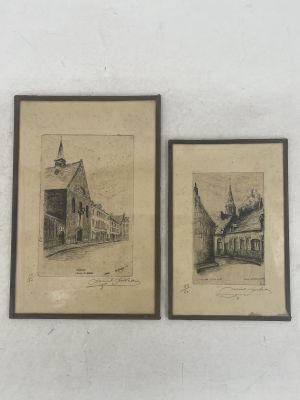 two framed drawings of a church and a church with a steeple