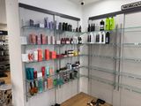 many shelves with different types of hair products on them