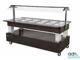 an image of a buffet table with four pans of food on it