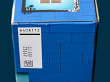 a blue box with a picture of a lego man on it