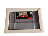 a nintendo game in a white box on a white surface