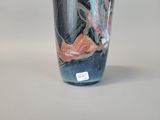 a vase that has a picture of a woman on it